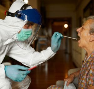 COVID testing performed with full PPE for patient safety and infection control