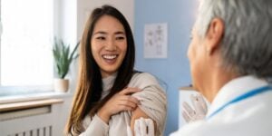 Medical provider discussing flu prevention and follow-up care