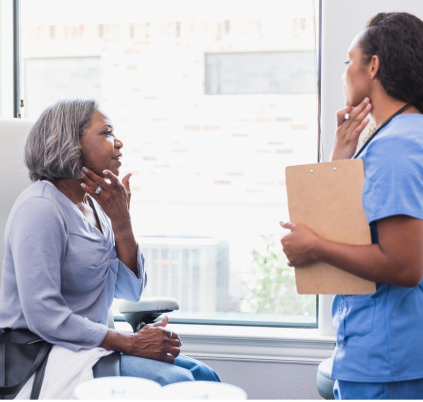 Senior Woman Talks with Dermatologist Senior Woman Talks with Dermatologist